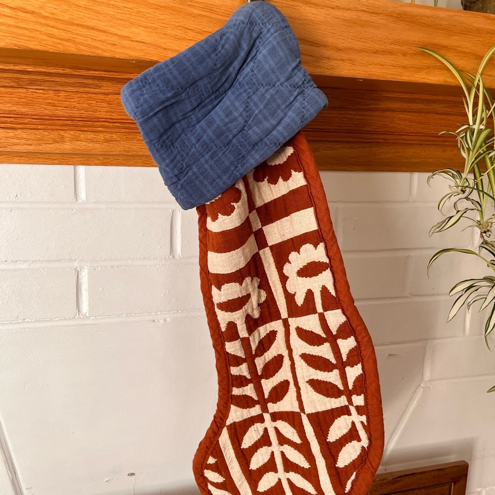 Schoolhouse Quilted Stocking with Blue Cuff and Brown Pattern